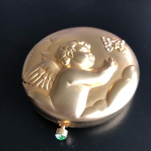 Estée Lauder ‘August’ Angel Compact Lucidity Transparent 06 pressed powder.